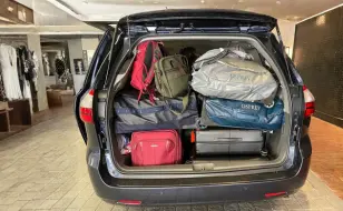 Extra Luggage Taxi cab Service at Logan Airport.